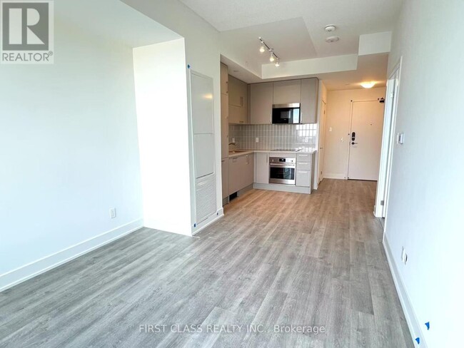 Building Photo - 38-1438 Andre de Grasse St