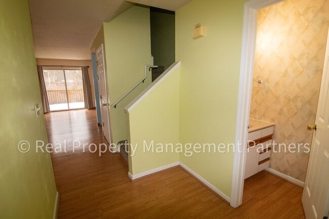 Building Photo - Forest Hills 3 Bed Townhome with Garage, Pond View and Some Utilities Included