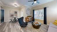Located at 2650 Western Center Blvd in Fort Worth, TX, this well-appointed one-bedroom, one-bathroom unit offers a smart, efficient layout across a single floor. The living room greets you with warm wood-style flooring, crown molding, a ceiling fan, and large windows that invite abundant natural light and outdoor views. A dining area flows naturally from the living space, adding functional versatility.

The kitchen is a standout feature, outfitted with crisp white cabinetry, a classic white subway tile backsplash, light quartz countertops, stainless steel appliances including a refrigerator, electric range, and microwave, and a peninsula with a deep undermount sink — ideal for both cooking and casual dining.

The bedroom is a comfortable retreat with a ceiling fan, crown molding, generous natural light through a large window with outdoor views, and direct access to a spacious walk-in closet with multi-tier wire shelving for ample storage.

The bathroom features a full tub-shower combination with white tile surround. A dedicated in-unit laundry room with a full-size washer and dryer adds everyday convenience. Wood-style flooring and neutral tones carry throughout, lending the entire space a cohesive, modern aesthetic.