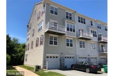 Building Photo - LUXURY 2 LEVEL END UNIT CONDO WITH WOOD FL...
