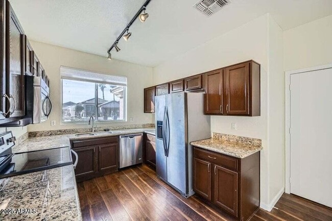 Building Photo - 15436 W Port Royale Ln