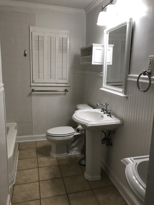 Bathroom with double vanity, bathtub and shower - 633 Clairmont Cir
