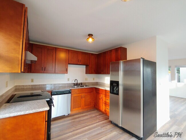 Foto del edificio - "Spacious 3-Bed Oasis with 2 Full Baths in Prime Seattle Location – 1800 Sq Ft of Comfort!"
