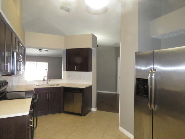Building Photo - Nice and Clean Four Bedroom, two bath & two car garage