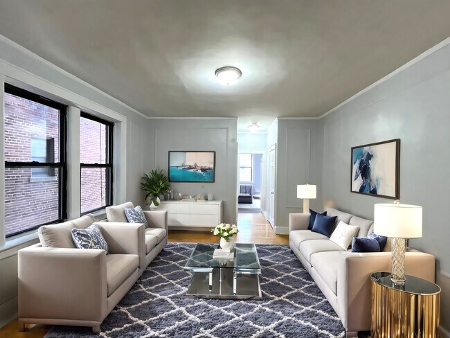 Building Photo - Hill Manor - Renovated Apartments Near Tra...