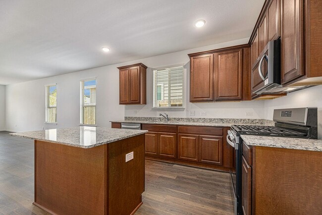 Building Photo - Like New 4 bedroom, 2 1/2 bath, 1 story in...