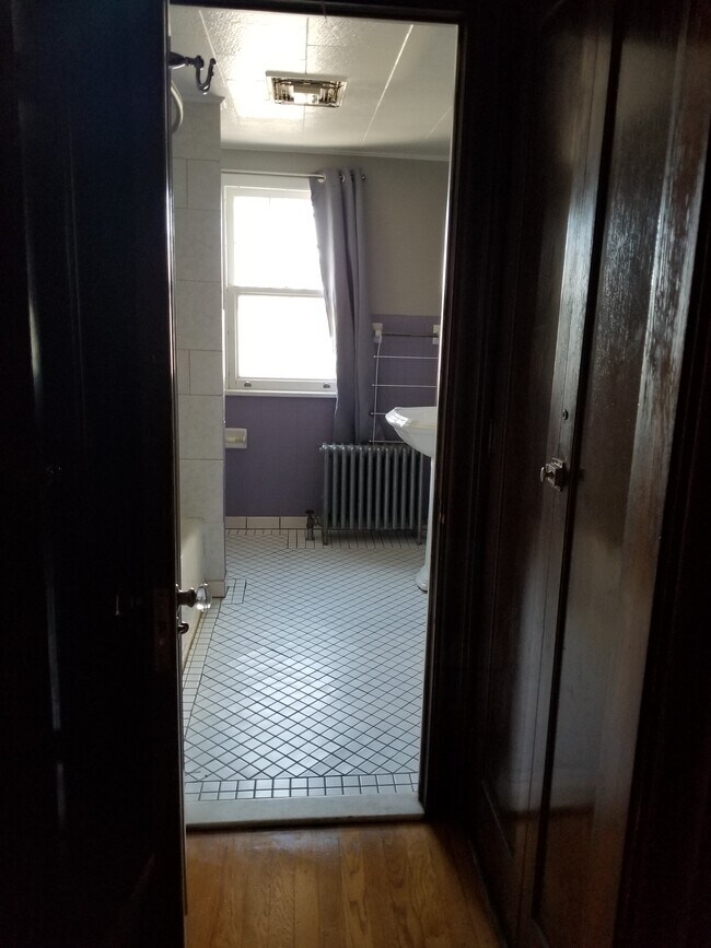 Bathroom . 2 large Linen closets to the left and right of entrance. - 3404 Main St