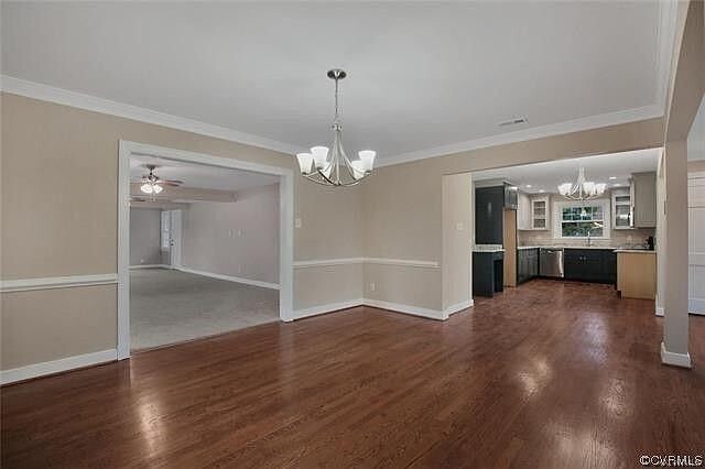 dining room looking into kitchen and family room - 8208 Chamberlayne Rd