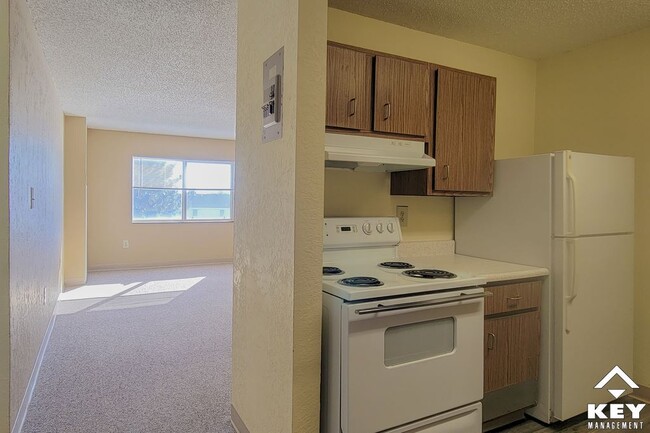 Kitchen & Living Room - Centennial Towers - 55+ Affordable Community