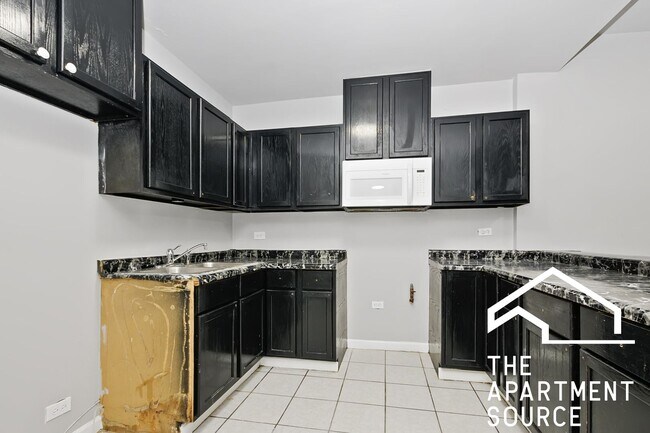 Building Photo - 6158 S Albany Ave