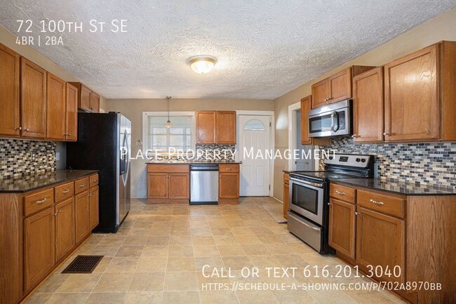 Foto del edificio - 72 100th St - Large 4Bed/2Bath Home