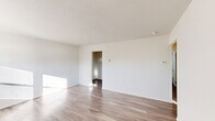 Located at 1223 S Sugar St in Lima, Ohio, this single-floor, three-bedroom, one-bathroom home offers a practical and efficient layout. Wood-look flooring runs consistently throughout the entire space, lending a cohesive, clean aesthetic to every room.

The living room is a bright, open area bathed in natural light from well-positioned windows, with neutral white walls and a textured ceiling that add depth to the room. A connecting hallway links the living area to the rest of the home.

The kitchen is well-appointed with white shaker-style cabinetry, granite-look countertops, a stainless steel sink, and a full suite of appliances including a refrigerator and electric range. A window above the dining area brings in additional natural light and provides an exterior view.

All three bedrooms feature the same durable wood-look flooring and bright white walls. Two of the bedrooms are equipped with sliding closet doors, providing convenient storage. The primary bedroom offers a comfortable footprint with good natural light. In total, the home includes five closets, ensuring generous storage options throughout.

A central hallway connects the bedrooms to the shared bathroom, creating a logical and efficient flow. The overall design is clean, minimal, and move-in ready.