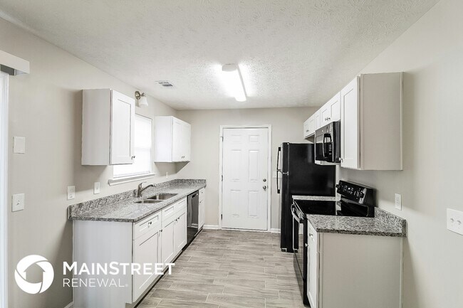 Foto del edificio - 6793 Creeks Edge Ct