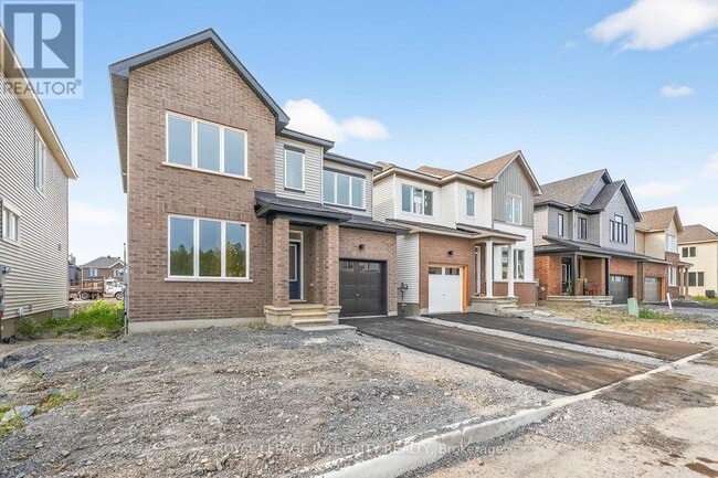 Building Photo - 335 Les Emmerson Dr