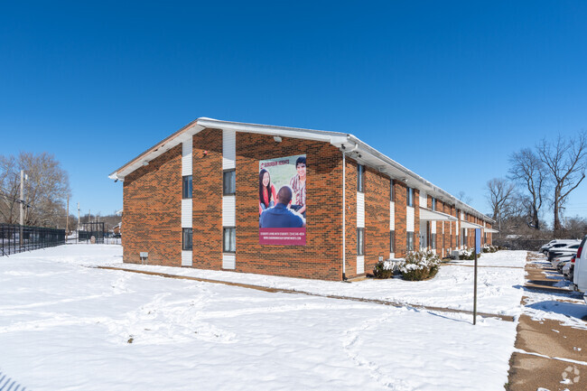 Combination of a Brick and Vinyl Façade - Suburban Heights