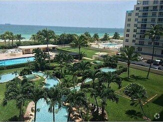 Building Photo - 5005 Collins Ave