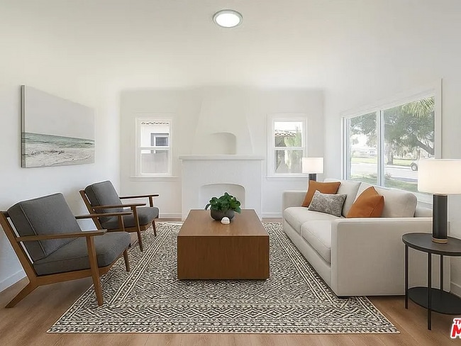 Living room with Decorative fireplace - 672 E 119th St