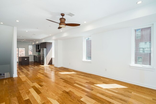 Building Photo - Stunning 4-Bedroom Townhouse with Garage and Rooftop Deck! Available late May!
