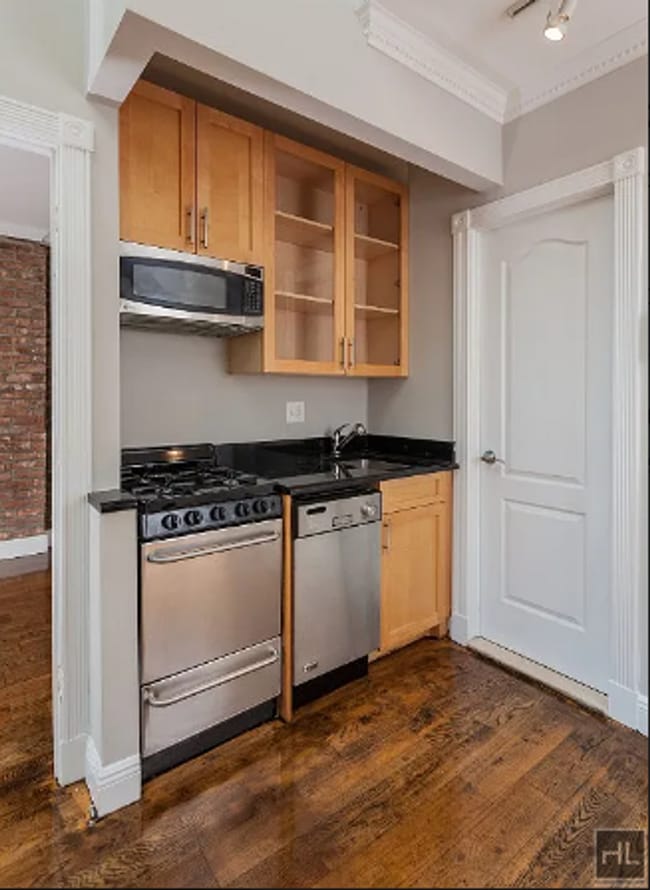 Building Photo - SUNNY West 21st Street True 1 Bedroom