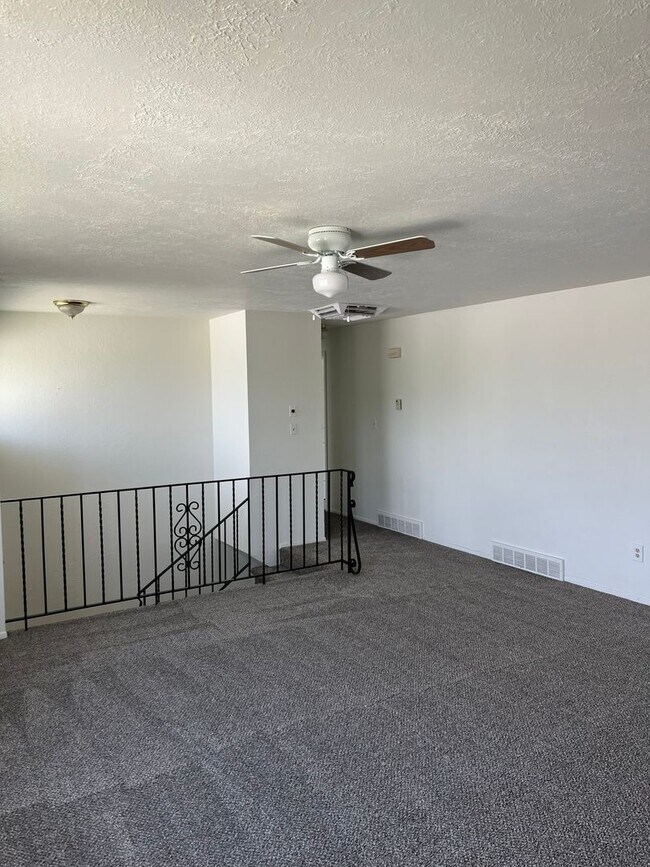 Building Photo - Spacious and Charming 4-Bedroom Home in Ta...