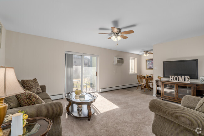 2BR, 1BA - 850SF - Living Room - Audubon Court Apartments