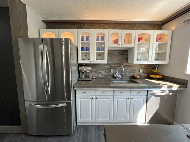 Building Photo - Charming 3-Bedroom Home with Custom Crafts...