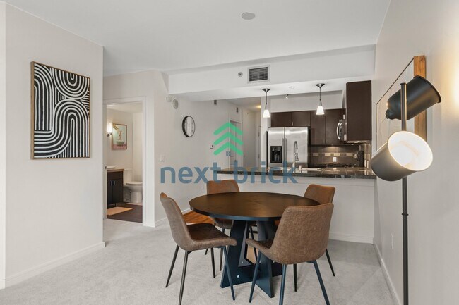 Building Photo - 1 Bedroom | 1 Bathroom | Southeast-Facing High-Floor Condo in Denny Triangle