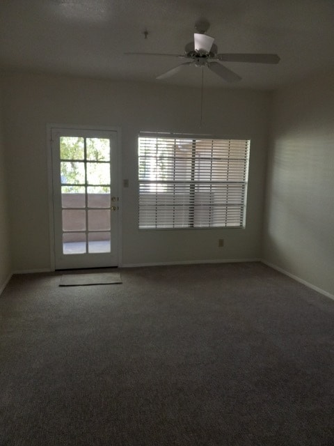 Living Room + Patio Area - 5950 N 78th St