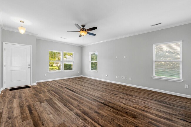 Building Photo - Newer Home, Granite Counter-Tops, Wood Laminate Flooring, SS Appliances, Garage, Fenced, Must See!
