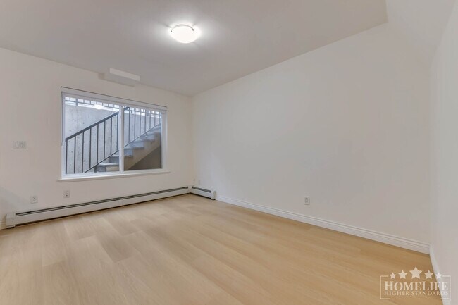 Photo du bâtiment - Bright 2 Bedroom Basement Suite in Quiet Cloverdale Location All Utilities Included