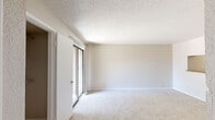 Located at 3016 SW 89th St in Oklahoma City, OK, this one-bedroom, one-bathroom unit offers a functional and comfortable single-floor layout. The combined kitchen and living area forms the heart of the home, featuring wall-to-wall carpet in the living space, textured walls, and a popcorn ceiling with a ceiling fan for added comfort. A sliding glass door opens to a private balcony, allowing natural light to fill the room and providing outdoor views. A convenient closet near the entryway adds practical storage.

The kitchen is efficiently designed with warm oak cabinetry, a butcher block-style countertop, a white electric range, and a full-size refrigerator. Tile flooring runs throughout the kitchen, adding durability to this functional space.

The bedroom is a comfortable, well-proportioned retreat with plush carpeting, a ceiling fan with light fixture, a window with natural light, and textured walls. Two closets within the unit provide ample storage options.

The bathroom features tile flooring, a wood-toned vanity with a countertop sink, and a full tub-shower combination with a curved curtain rod. The clean, bright finishes keep the space feeling fresh and functional. Overall, the unit offers a straightforward, livable layout suited for everyday comfort.