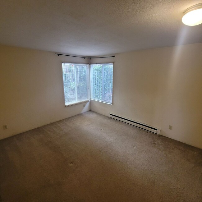 Building Photo - Tanager Condominiums- Main Floor Unit with...