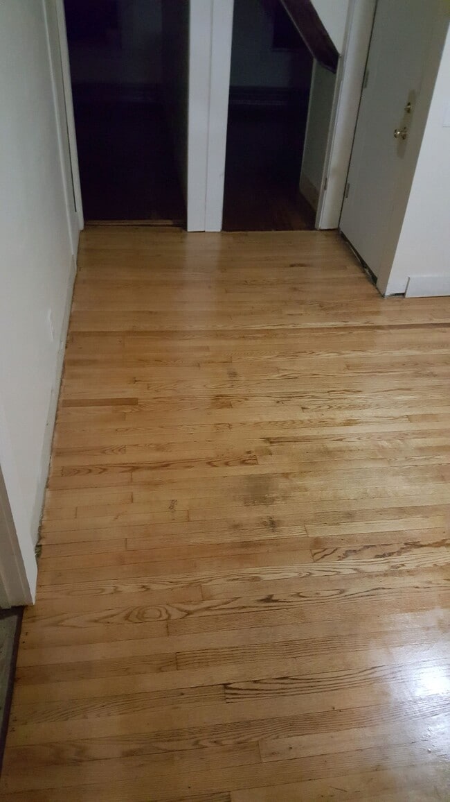 Living room. - 176 E Main St