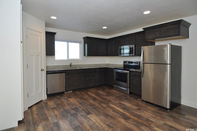 Building Photo - Gorgeous 3-Story Townhomes in Payton's Qua...