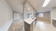 This well-designed one-bedroom apartment in Arbor Park of Alexandria offers 730 square feet of living space on a single floor. The heart of the home is a sleek, modern kitchen featuring stainless steel appliances, including a gas range and over-the-range microwave. White upper cabinets contrast beautifully with dark lower cabinets, while a subway tile backsplash adds a touch of classic style.

The living and dining area is spacious and bright, with plush carpeting and a sliding glass door leading to a private balcony. This outdoor space allows for fresh air and views of the surrounding area. The bedroom, measuring 170 square feet, is generously sized and includes a ceiling fan for comfort. It features two windows with blinds, providing natural light and privacy control.

The bathroom showcases a neutral color scheme with beige tiled walls and a white bathtub-shower combination. Throughout the apartment, neutral wall colors and carpeting create a blank canvas for personal decor. The hallway includes a closet for additional storage, and the overall layout promotes easy flow between rooms. With its modern amenities and thoughtful design, this apartment offers a comfortable and contemporary living space in a convenient Alexandria location.