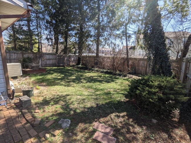 Fenced in back yard - 387 Huber Village Blvd