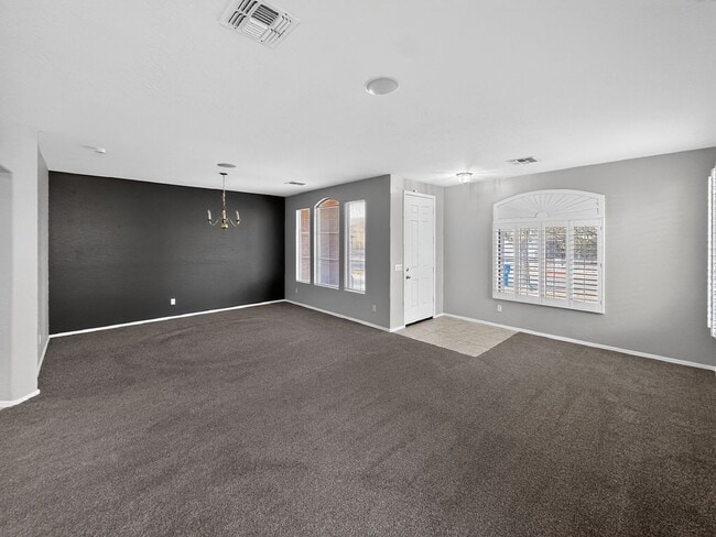 Building Photo - Single-level 4 bed, 2 bath home with tandem 3-car garage and RV gate.