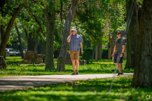 Enjoy the outdoors year round in Alamo Heights at the trails around Olmos Basin Park.