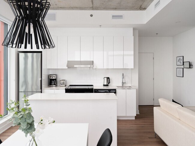 Photo du bâtiment - Zenith Condo Rentals Quartier Latin