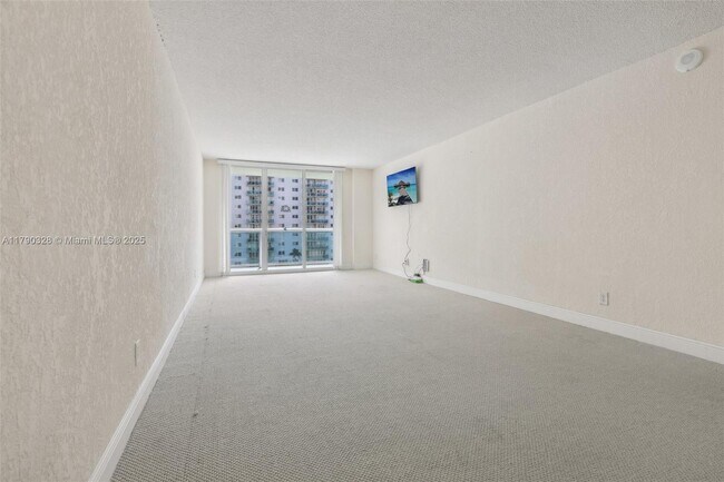 Building Photo - 19390 Collins Ave