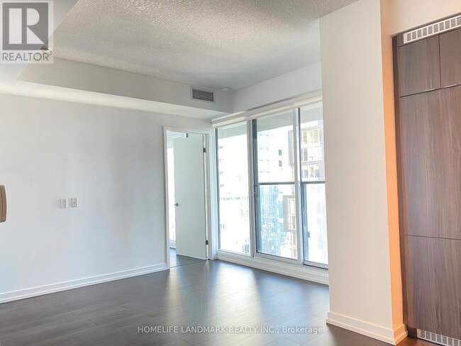 Building Photo - 125-4125 Blue Jays Way