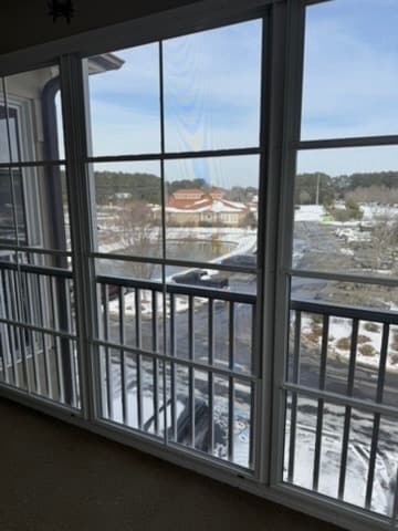 balcony overlooking pool and wellness center - 395 S Crow Creek Dr NW