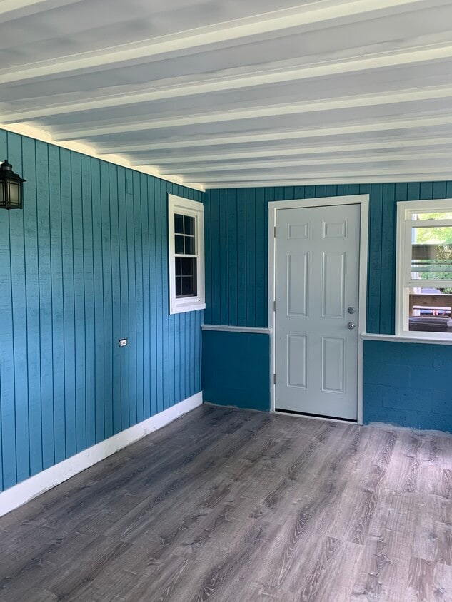 Enclosed porch door to backyard - 67 E Creek Cir
