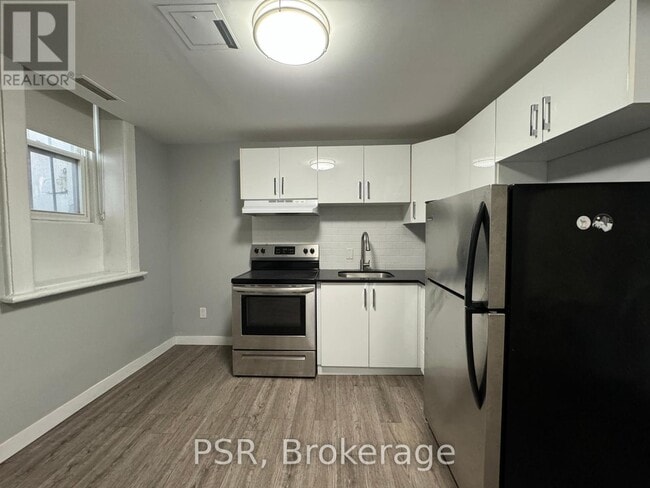 Building Photo - 205-205 Gerrard St E
