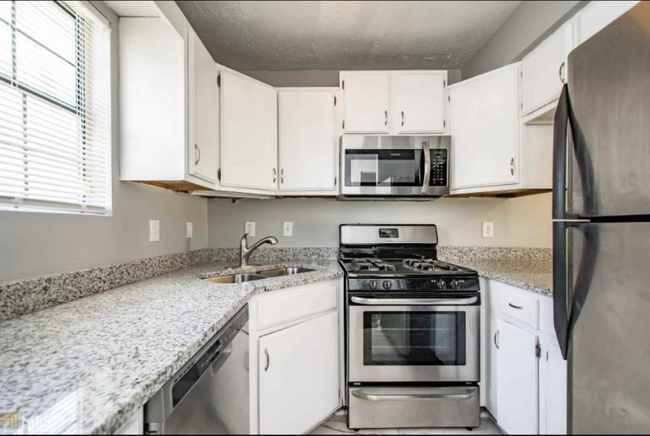 Building Photo - 6988 Flagstone Dr
