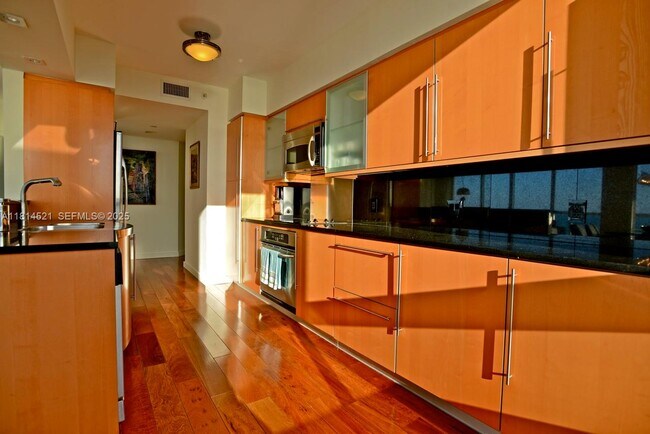 Building Photo - 6365 Collins Ave