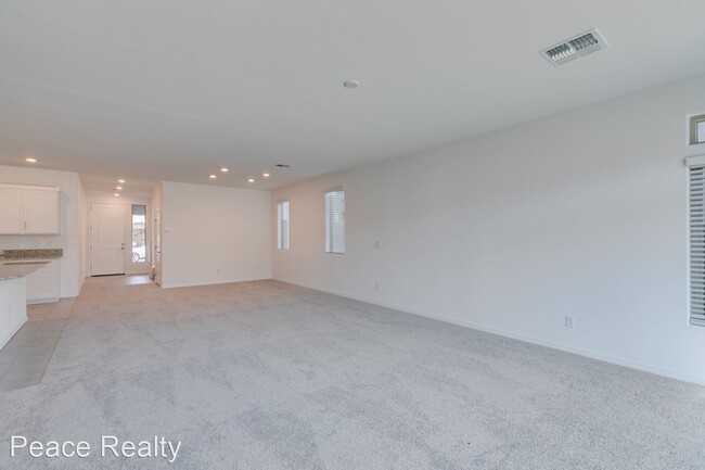 Foto del edificio - 4 br, 3.5 bath House - 7053 SUNLAND HILLS