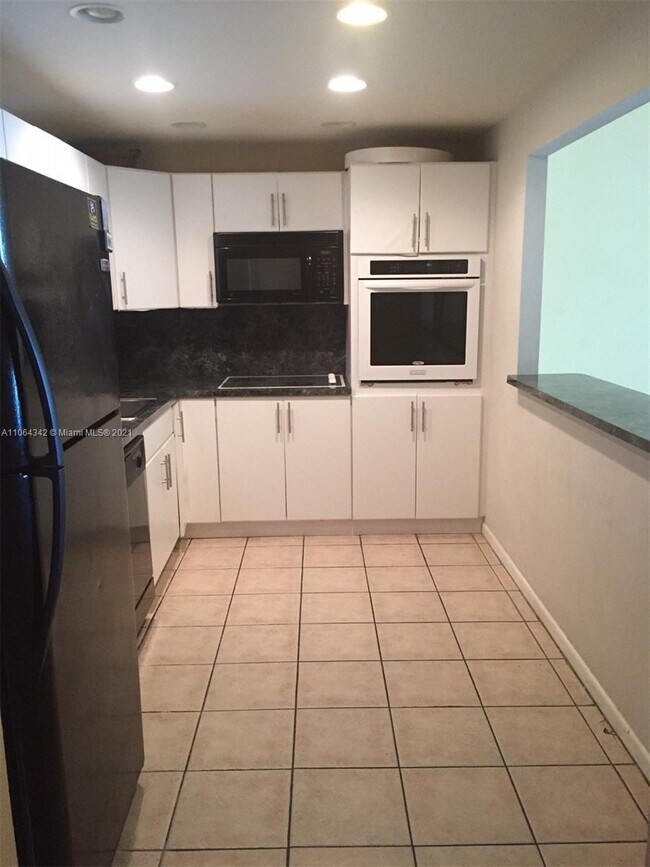 Building Photo - 19380 Collins Ave