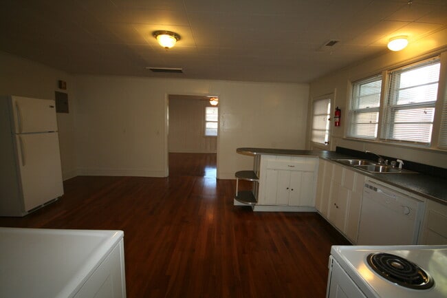 Building Photo - Spacious Walltown Duplex with All Appliances and Fenced Backyard!