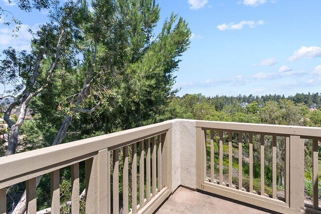 Building Photo - Beautiful End Unit Condo with Overlook of ...